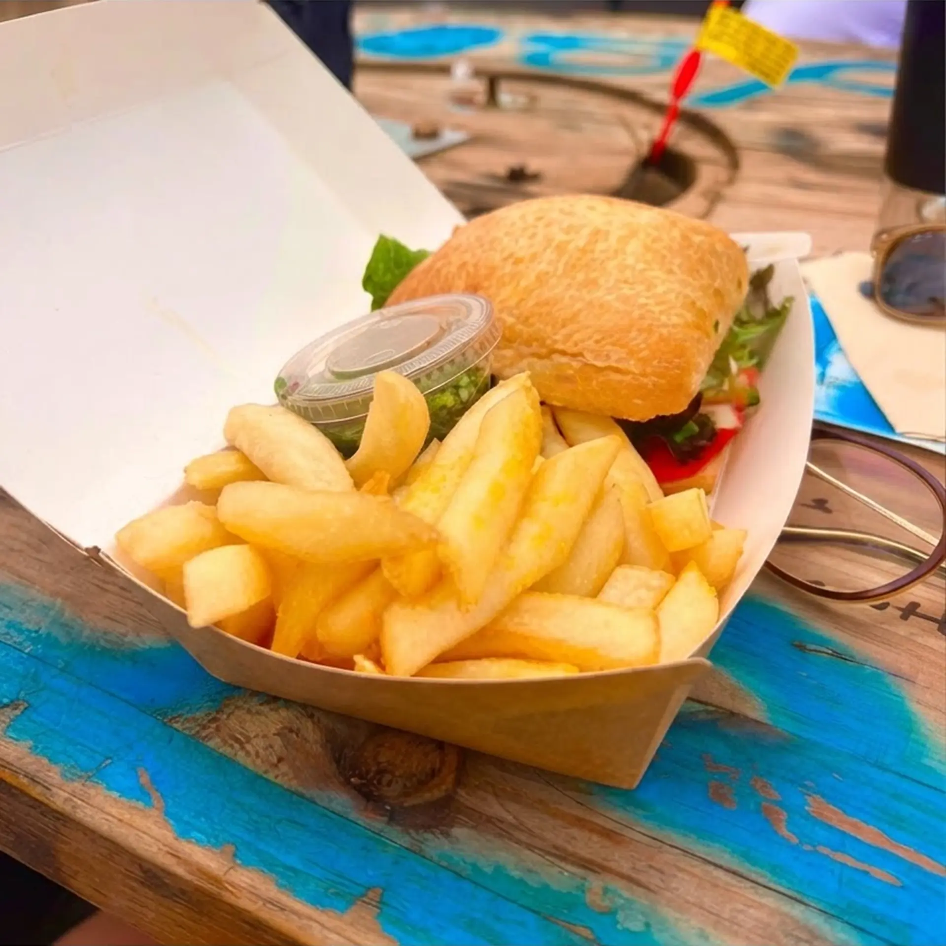 Golden chips served with a milanesa sandwich
